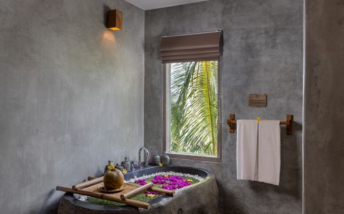 Special Room Flower Decoration With Fresh Coconut And Whole Cake